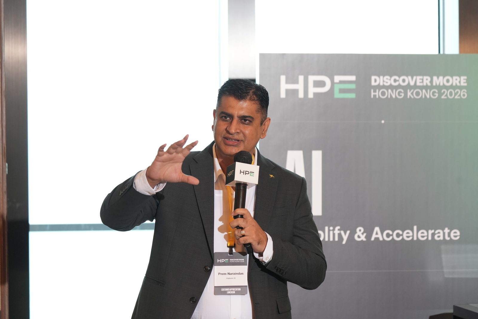 Prem Naraindas speaking at HPE Discover More Hong Kong 2026, HPE Discover More branding behind him